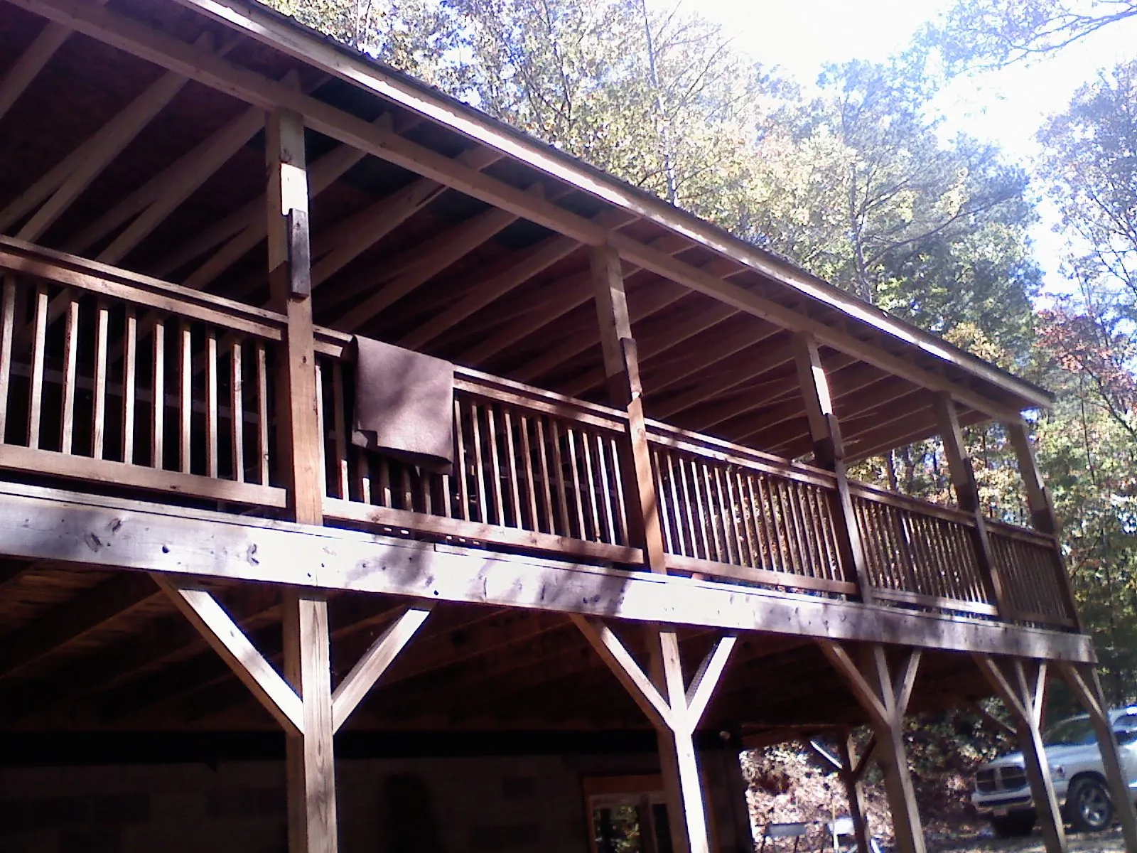 Timber framing under a new elevated porch and deck — Roof Leak Repair in New Deal by Roofing Brothers